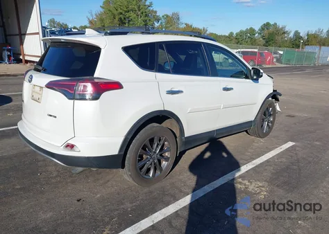 2018 Toyota Rav4 Limited z USA, uszkodzony, nr VIN JTMYFREV6JJ730453